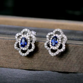 White Gold Oval Sapphire Flower Scalloped Studs